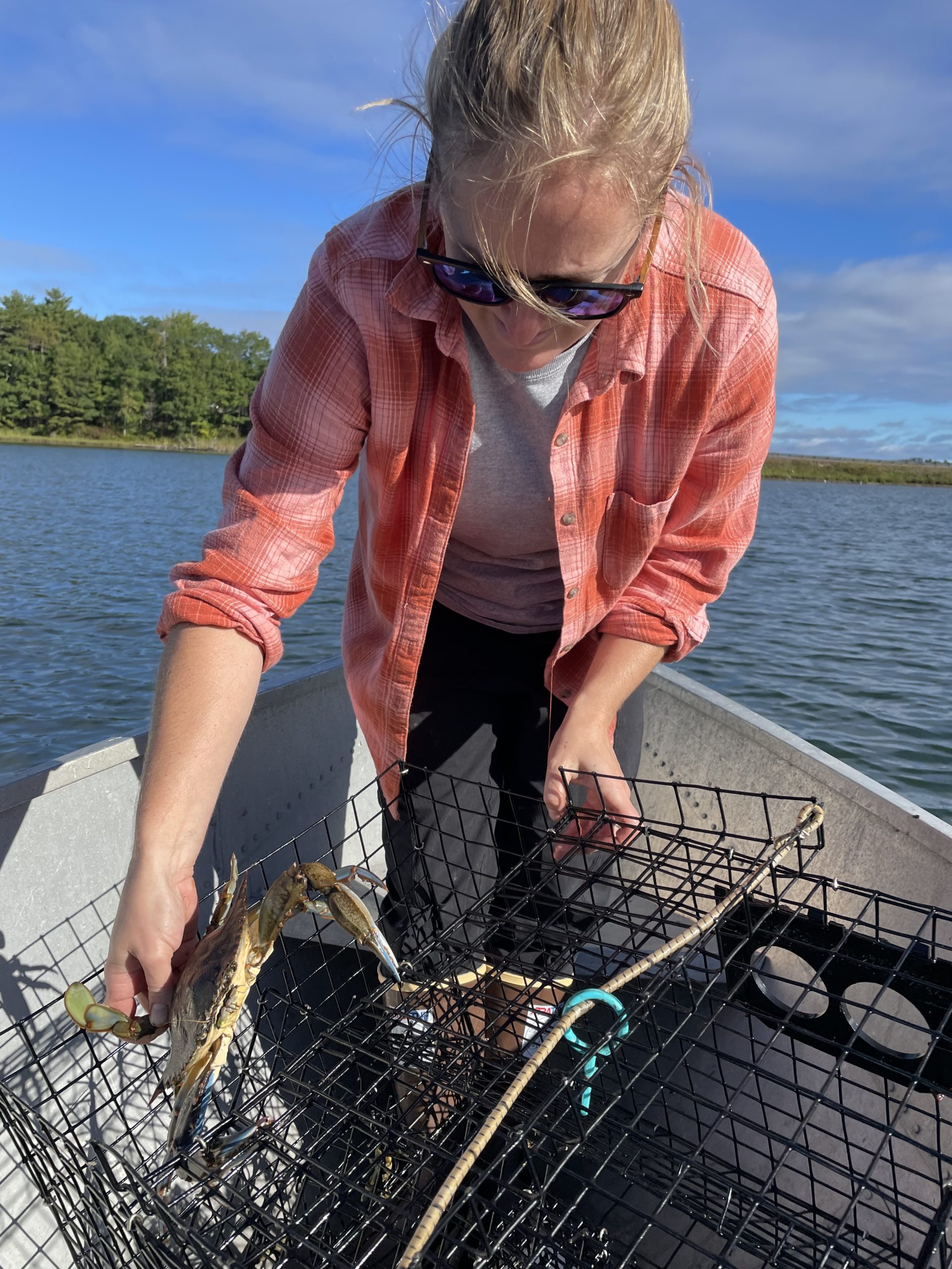 Marissa McMahan, Senior Director of Fisheries, with blue crab.